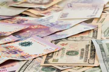 US Dollar und Argentinische Peso Geldschein