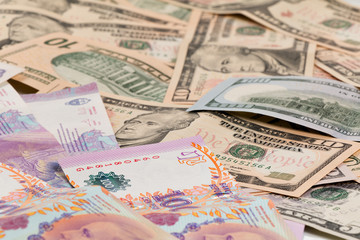Fototapeta na wymiar US Dollar und Argentinische Peso Geldscheine