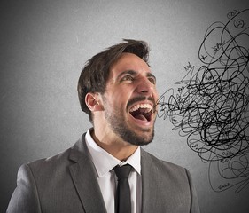 Stressed businessman screams