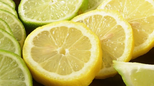 Pan across sliced lemons and limes
