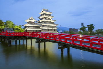 Matsumoto castle and red bridgein night, Nagono, Japan