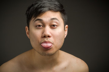 Obraz premium Model isolated sticking tongue out