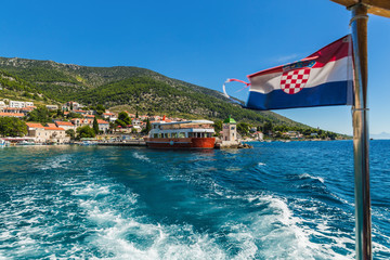 Croatian Bol city on Brac island view from sea .