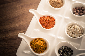 Wooden table of colorful spices