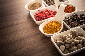 Wooden table of colorful spices