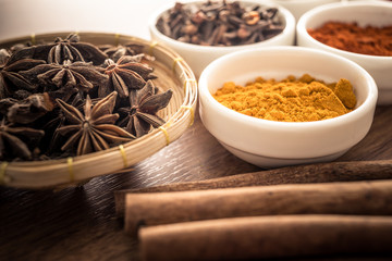 Wooden table of colorful spices