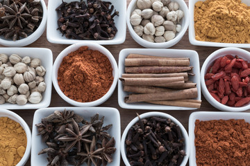Wooden table of colorful spices
