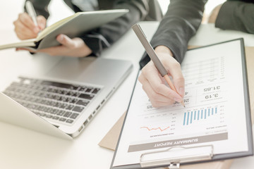 Business people discussing the charts and graphs showing the res