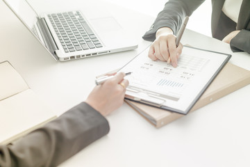 Business people discussing the charts and graphs showing the res