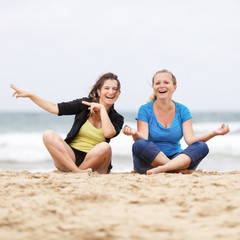 Two beautiful laughing young women