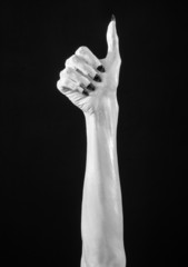 white hands of death with black nails, white death, white skin