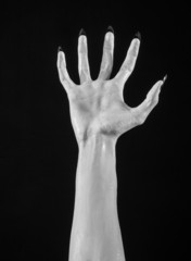 white hands of death with black nails, white death, white skin