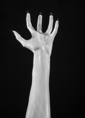 white hands of death with black nails, white death, white skin