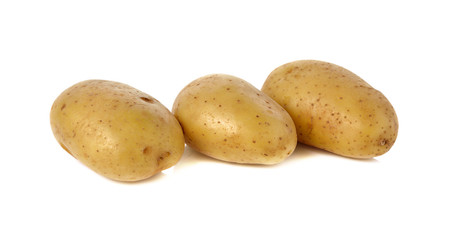 closeup unpeeled fresh potato on white background