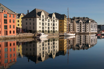 Ålesund, Norway, with beautiful Jugend architecture buildings reflected in calm water