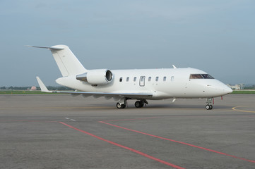 Business jet airplane on the ground