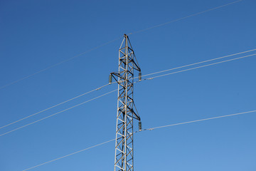 Metal pylon with a blue sky