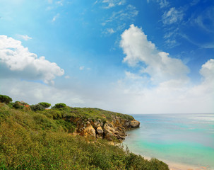 cloudy sky over Alghero shoreline