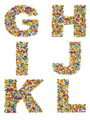 Letters of the alphabet G through L made from colorful glass bea