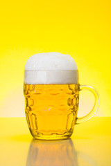 Mug with fresh, foamy beer