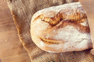 Homemade bread on a wooden table.