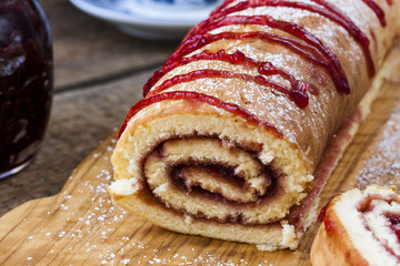 Biscuit roulade with cherry jam