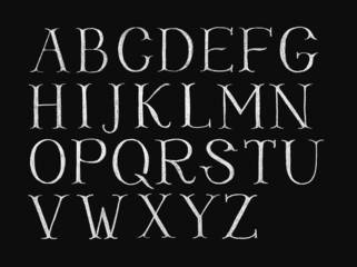 Alphabet hand-drawn on chalkboard