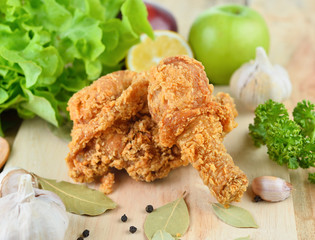 fried chicken isolated on wooden  background