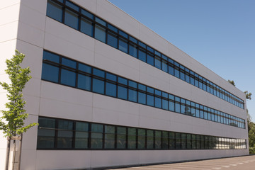 Modern new office building under a blue sky