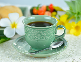 cups of tea with mint on wooden table