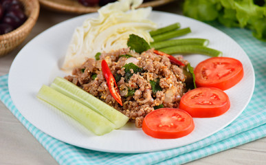 Thai food, spicy pork with chili and mint