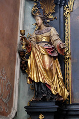 Fototapeta premium Saint Barbara on the altar of St. Anne in Parish church in St. Wolfgang on Wolfgangsee in Austria