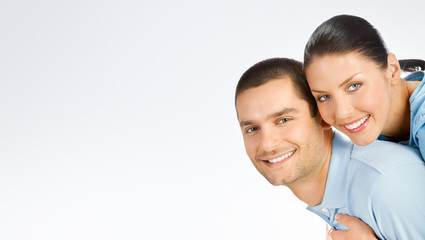 Obraz premium Portrait of amorous young couple, with copyspace