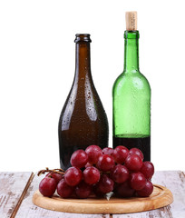 Obraz premium wine glass with red wine, bottle of wine and isolated 