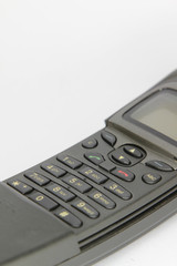 Closeup of mobile phone keypad isolated on white.