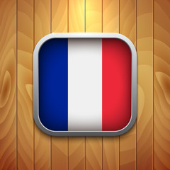 Rounded Square France Flag Icon on Wood Texture.