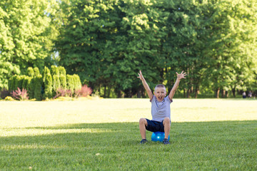 Boy children playing ball