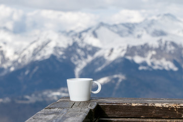 Cup of Tea on Mountains Background