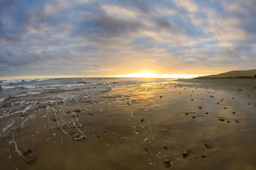 Sunset over the coast of Atlantic ocean