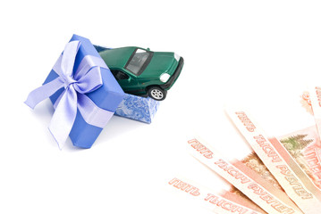 green car in blue gift box and banknotes