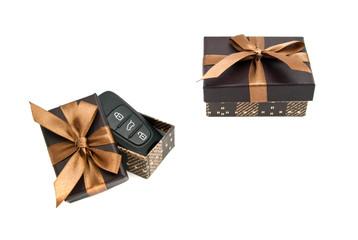 car keys and brown gift boxes