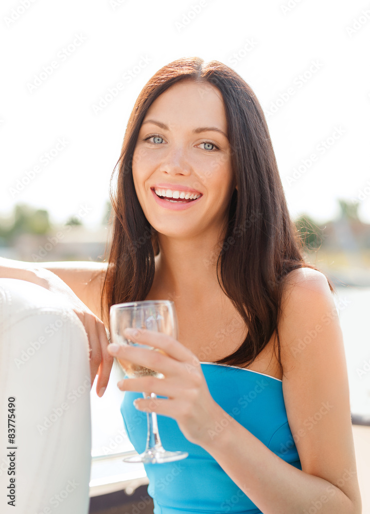 Poster laughing girl with champagne glass