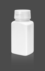 blank white supplement packaging bottle isolated on gray backgro