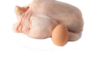 Crude Hen and crude egg  on a white background