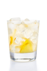 Refreshing ice cold ginger tea in transparent glass