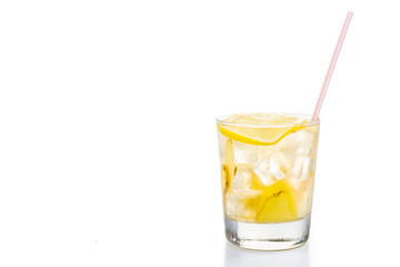 Fototapeta na wymiar Refreshing ice cold ginger lemon tea in transparent glass