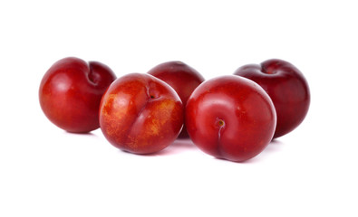 Ripe plum fruit on white background