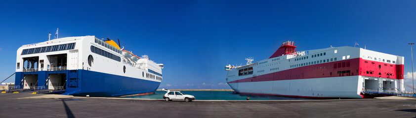 Two passenger ferries in harbor, Crete, Greece.