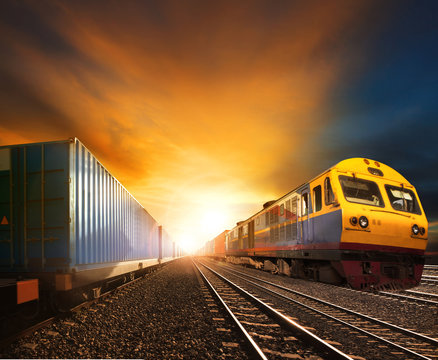 industry container trainst running on railways track against bea