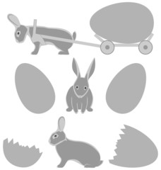 Grey rabbits with eggs isolated on white background